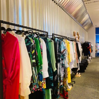 WhatsApp Image 2020-06-01 at 11.03.01 AM Clothes on display on clothing racks in store